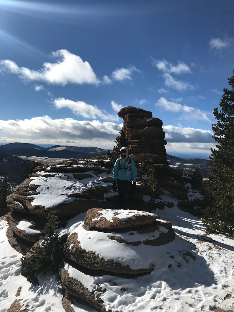 Pancake shaped rocks and snow on the southwest side of Pike