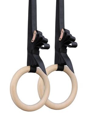 Pair of wooden gymnastic rings with black straps for bodyweight strength
